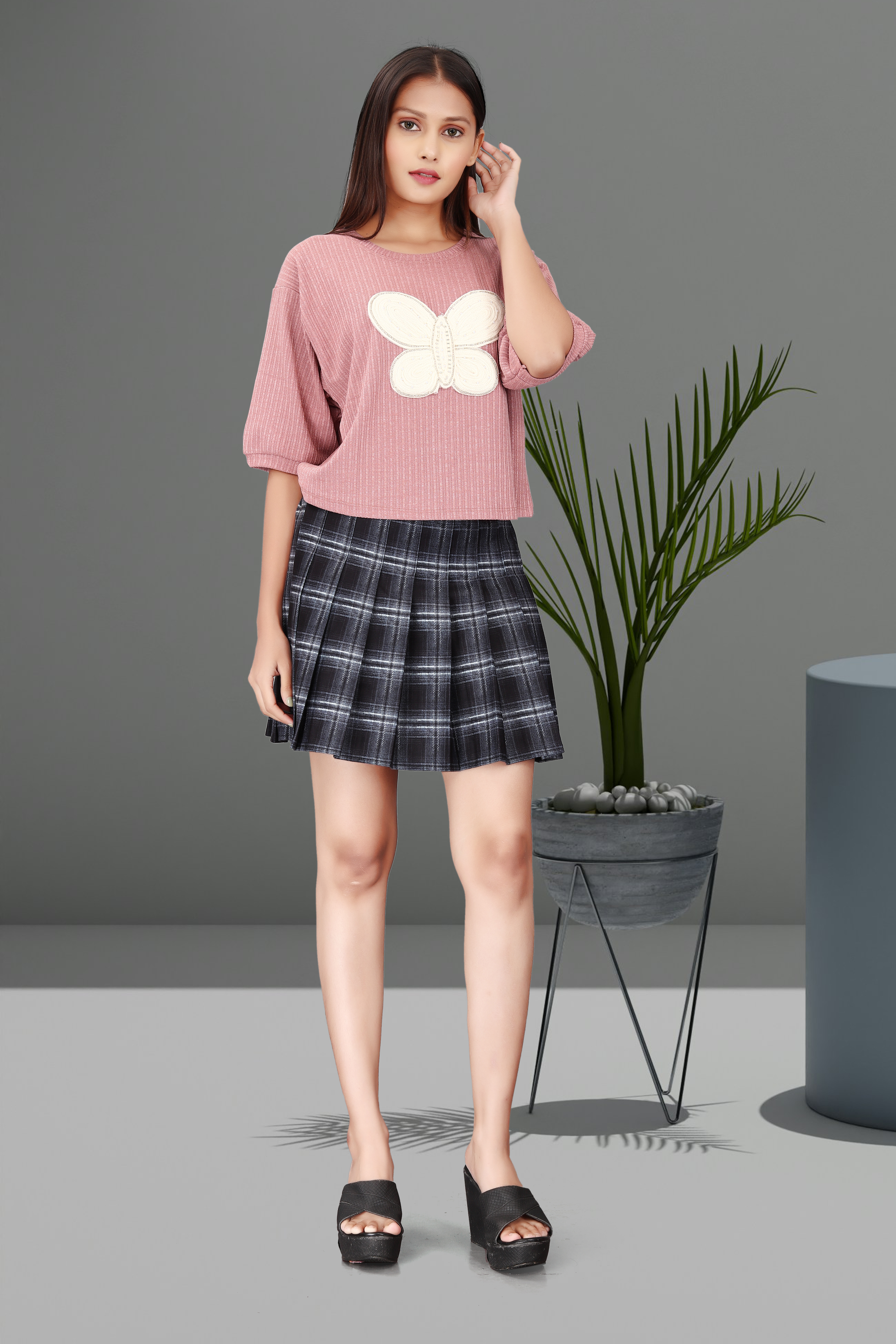 Pink Butterfly Motif Top with Black Check Pleated Mini Skirt – Stylish Women’s Casual Outfit